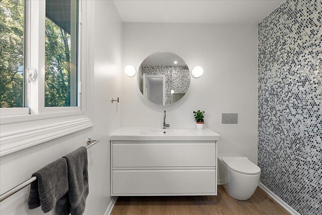 7044 Cascade Rd SE, Grand Rapids, MI 49546 - bathroom with vanity and wood finished floors