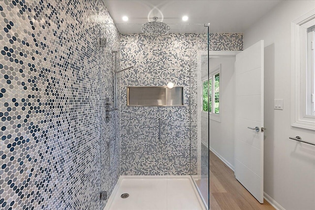 7044 Cascade Rd SE, Grand Rapids, MI 49546 - bathroom with a walk in shower, wood finished floors, and recessed lighting