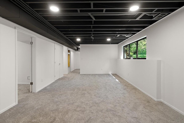 7044 Cascade Rd SE, Grand Rapids, MI 49546 - basement with carpet and baseboards