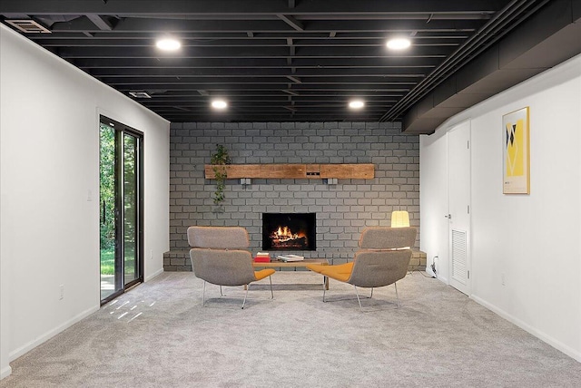 7044 Cascade Rd SE, Grand Rapids, MI 49546 - living area featuring carpet flooring and a fireplace