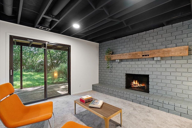7044 Cascade Rd SE, Grand Rapids, MI 49546 - living area with carpet floors and a brick fireplace