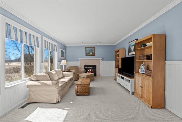 9009 N Pheasant Ridge Ln, Saline, MI 48176 - living area featuring light colored carpet, wainscoting, a fireplace with flush hearth, and crown molding