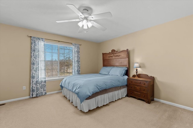 9009 N Pheasant Ridge Ln, Saline, MI 48176 - bedroom featuring light colored carpet, baseboards, and a ceiling fan