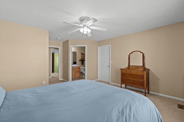 9009 N Pheasant Ridge Ln, Saline, MI 48176 - bedroom featuring light carpet, baseboards, connected bathroom, and a ceiling fan