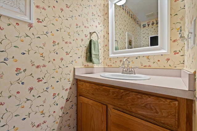 9009 N Pheasant Ridge Ln, Saline, MI 48176 - bathroom featuring wallpapered walls and vanity