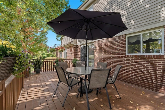 9009 N Pheasant Ridge Ln, Saline, MI 48176 - wooden deck with outdoor dining space