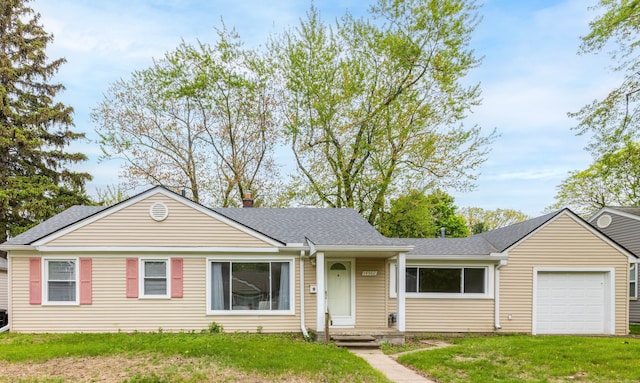 14560 Arden St, Livonia, MI 48154 - view of front facade with a garage, roof with shingles, a front lawn, and a chimney