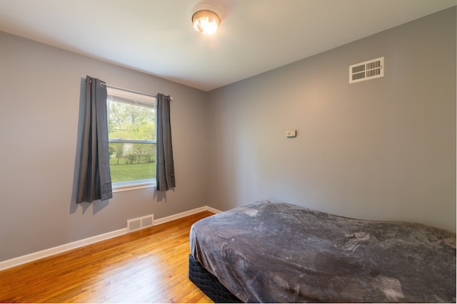 14560 Arden St, Livonia, MI 48154 - bedroom with wood finished floors and baseboards