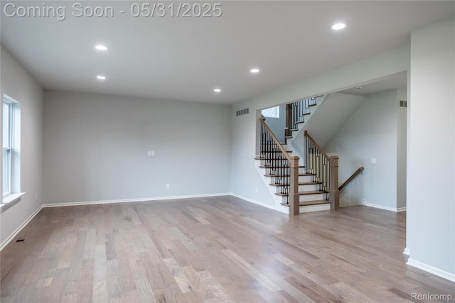24180 Liberty Hill Dr, Farmington, MI 48336 - unfurnished living room with recessed lighting, wood finished floors, stairway, and baseboards