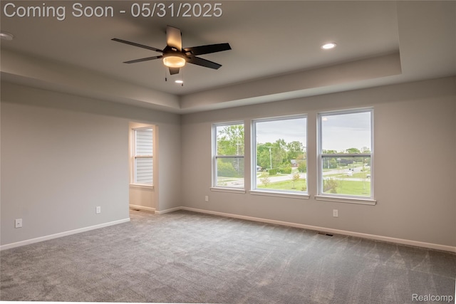 24180 Liberty Hill Dr, Farmington, MI 48336 - spare room featuring carpet floors, ceiling fan, baseboards, a tray ceiling, and recessed lighting