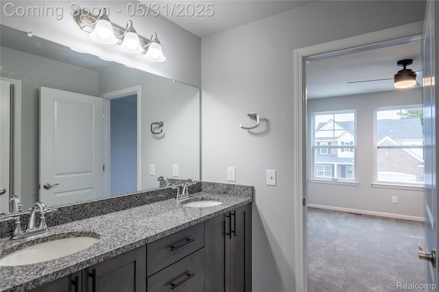 24180 Liberty Hill Dr, Farmington, MI 48336 - bathroom with double vanity and baseboards