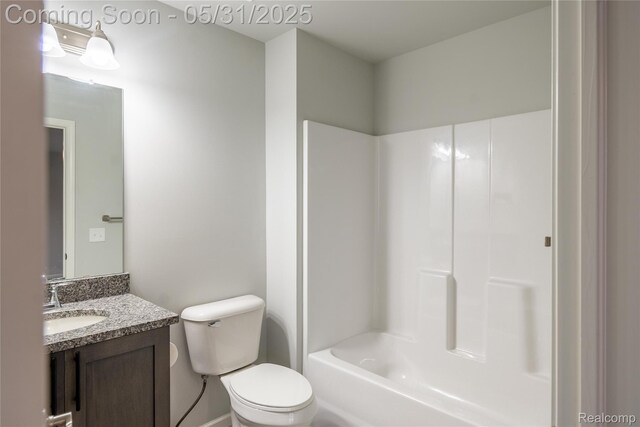 24180 Liberty Hill Dr, Farmington, MI 48336 - bathroom featuring vanity, toilet, shower / bathtub combination, and baseboards