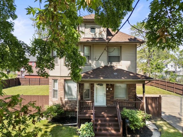 view of front of home featuring a gate and a shingled roof