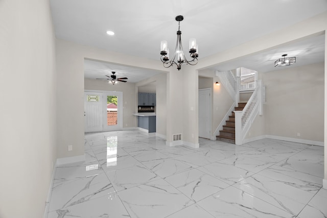unfurnished living room with baseboards, recessed lighting, stairway, a chandelier, and marble finish floors