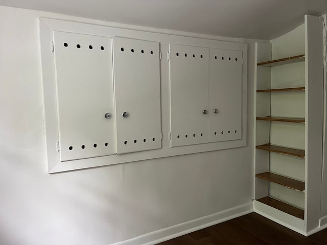 detailed view of wood finished floors and baseboards