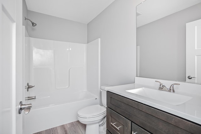 2421 Darah St, Niles, MI 49120 - full bath with toilet, wood finished floors, washtub / shower combination, and vanity