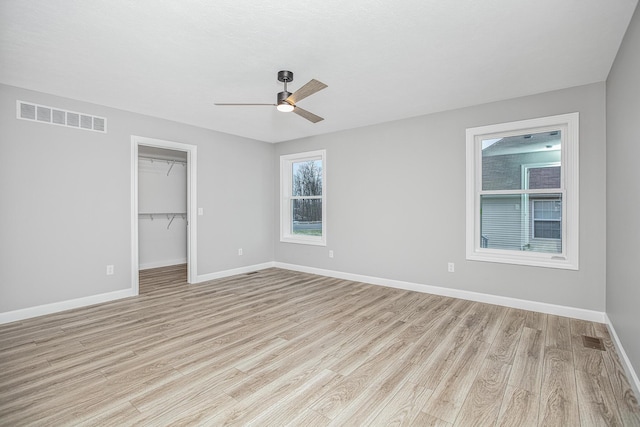 2421 Darah St, Niles, MI 49120 - spare room with light wood finished floors, ceiling fan, and baseboards