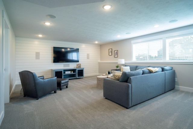 3280 Amtrak Dr SW, Byron Center, MI 49315 - carpeted living area with recessed lighting, wooden walls, and baseboards