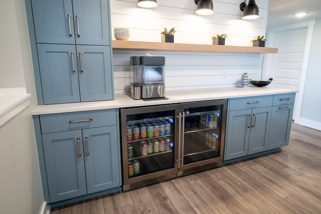 3280 Amtrak Dr SW, Byron Center, MI 49315 - indoor dry bar with wine cooler, wood finished floors, and baseboards