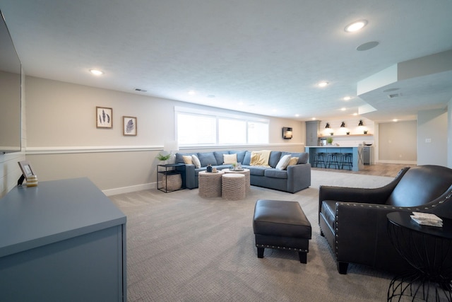 3280 Amtrak Dr SW, Byron Center, MI 49315 - living area with recessed lighting, light colored carpet, and baseboards