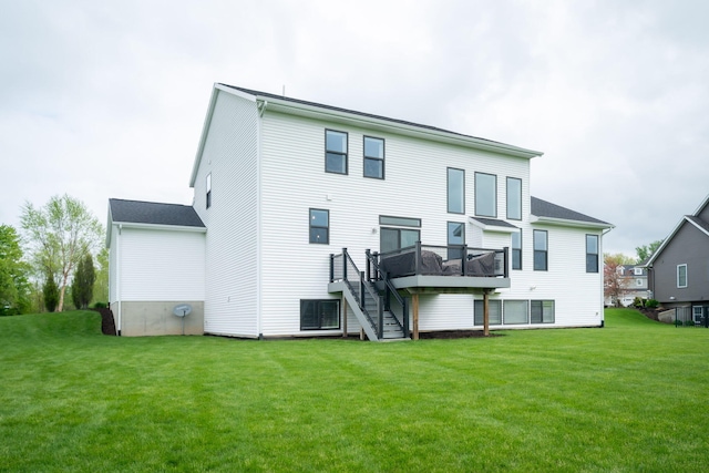 3280 Amtrak Dr SW, Byron Center, MI 49315 - rear view of property with stairs, a yard, and a deck