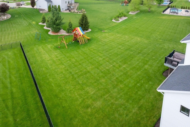 3280 Amtrak Dr SW, Byron Center, MI 49315 - view of green lawn with a playground