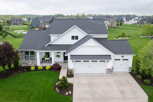 3280 Amtrak Dr SW, Byron Center, MI 49315 - modern inspired farmhouse featuring stone siding, a shingled roof, and an attached garage