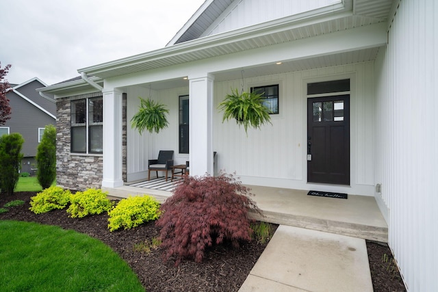 3280 Amtrak Dr SW, Byron Center, MI 49315 - property entrance featuring a porch and stone siding
