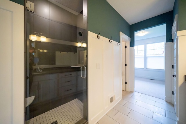 3280 Amtrak Dr SW, Byron Center, MI 49315 - full bath with a shower stall, tile patterned floors, and a sink