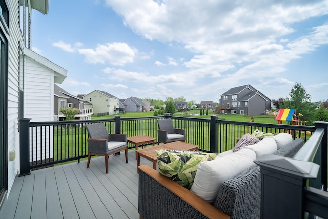 3280 Amtrak Dr SW, Byron Center, MI 49315 - wooden deck featuring a residential view, an outdoor hangout area, a lawn, and a playground
