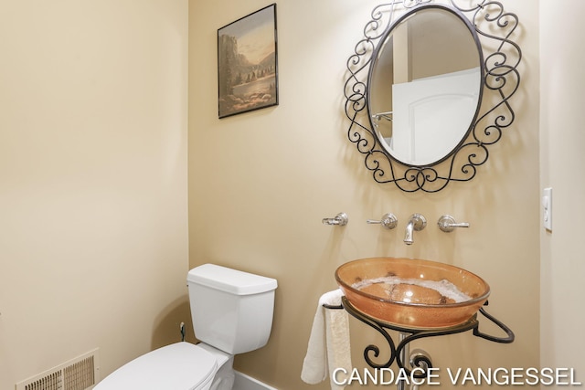 2429 Shears Crossing Ct NE, Grand Rapids, MI 49525 - half bathroom with toilet and a sink