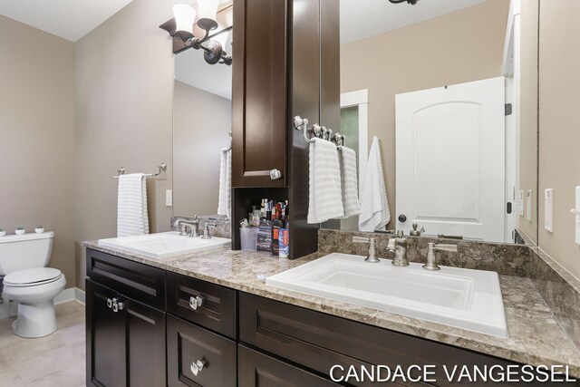 2429 Shears Crossing Ct NE, Grand Rapids, MI 49525 - bathroom with toilet and double vanity