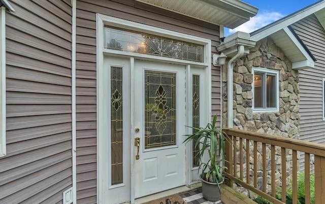 5856 Peck Rd, Brown City, MI 48416 - doorway to property with stone siding