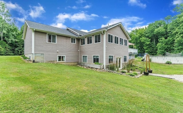 5856 Peck Rd, Brown City, MI 48416 - back of house with a lawn