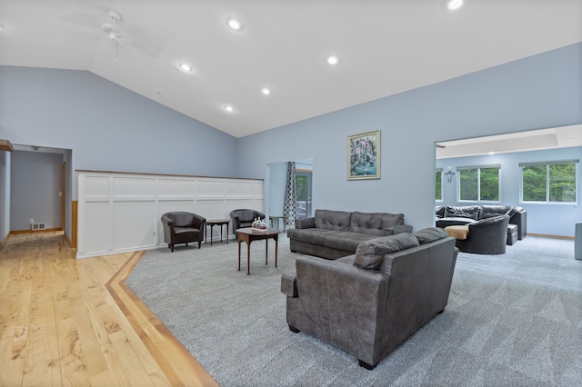 5856 Peck Rd, Brown City, MI 48416 - living area featuring high vaulted ceiling, recessed lighting, and light wood-style floors