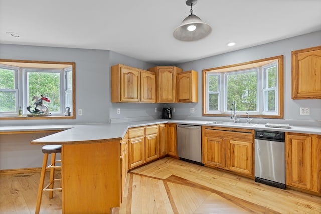 5856 Peck Rd, Brown City, MI 48416 - kitchen featuring stainless steel dishwasher, a sink, healthy amount of natural light, a peninsula, and recessed lighting