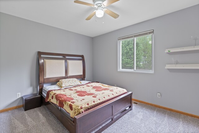 5856 Peck Rd, Brown City, MI 48416 - carpeted bedroom with baseboards and a ceiling fan