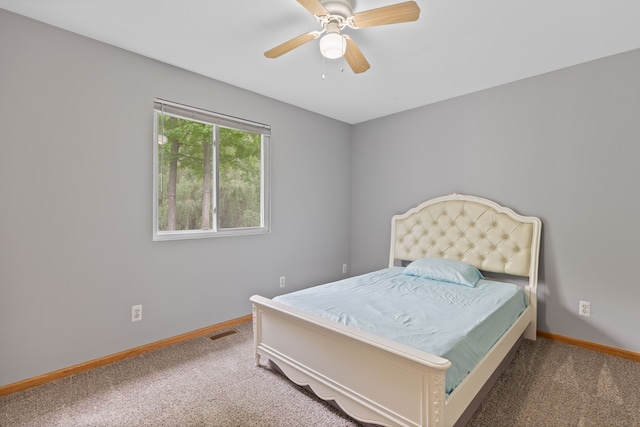 5856 Peck Rd, Brown City, MI 48416 - bedroom with carpet floors, baseboards, and a ceiling fan