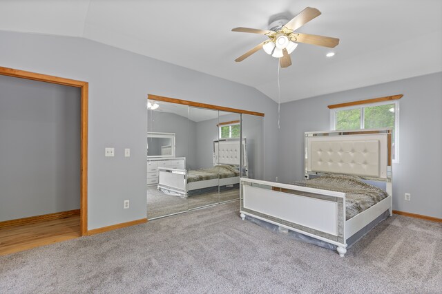5856 Peck Rd, Brown City, MI 48416 - carpeted bedroom featuring lofted ceiling, baseboards, ceiling fan, and a closet