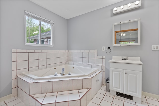 5856 Peck Rd, Brown City, MI 48416 - full bathroom with a garden tub, vanity, baseboards, and tile patterned flooring