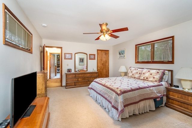 217 Maple Rd, Roscommon, MI 48653 - bedroom featuring light colored carpet and a ceiling fan