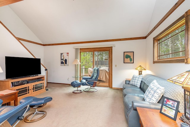 217 Maple Rd, Roscommon, MI 48653 - carpeted living area featuring vaulted ceiling, baseboards, and ornamental molding