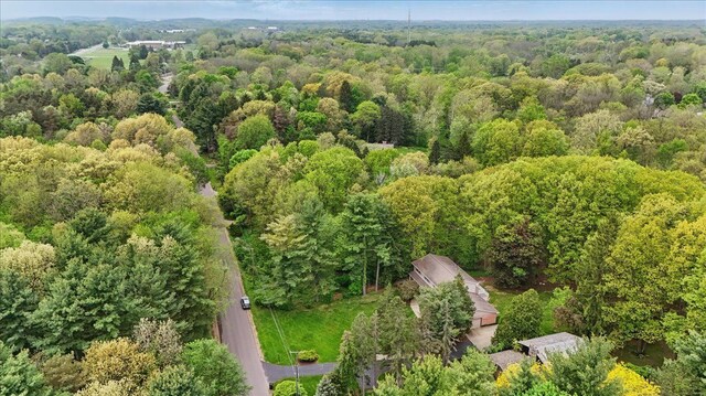 1558 Sylvan Glen Rd, Okemos, MI 48864 - aerial overview of property's location with a forest