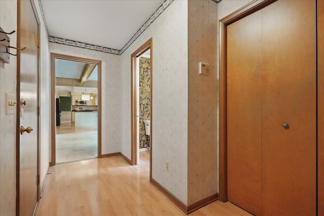 1558 Sylvan Glen Rd, Okemos, MI 48864 - corridor with light wood-type flooring and wallpapered walls