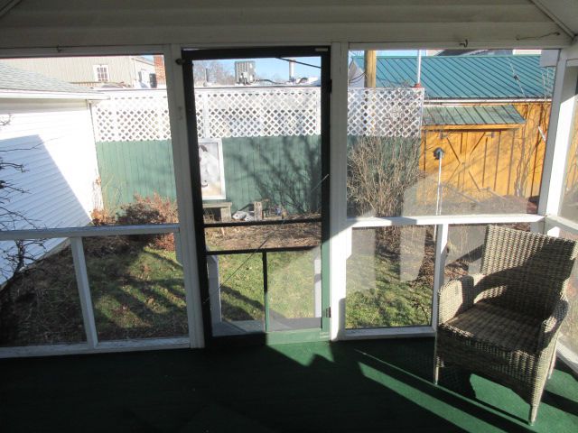 110 N 1st St, Holly, MI 48442 - view of sunroom / solarium