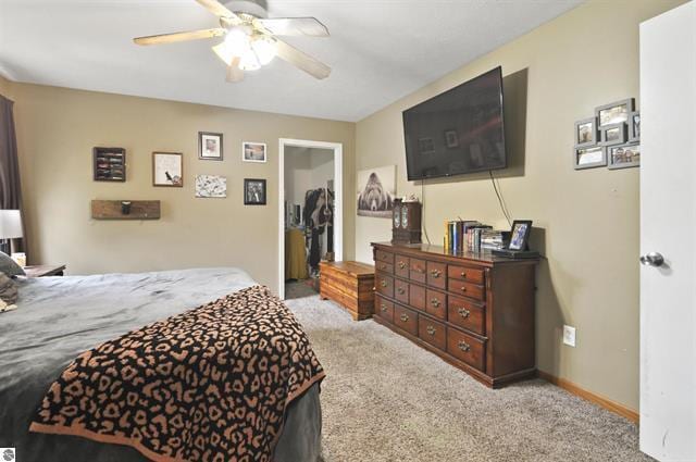 2426 E 48 1/2 Rd, Cadillac, MI 49601 - carpeted bedroom featuring ceiling fan
