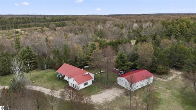 2426 E 48 1/2 Rd, Cadillac, MI 49601 - aerial view of a heavily wooded area