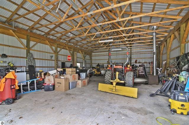 2426 E 48 1/2 Rd, Cadillac, MI 49601 - garage featuring metal wall