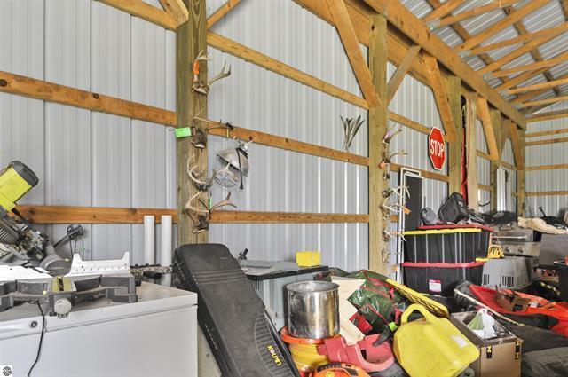 2426 E 48 1/2 Rd, Cadillac, MI 49601 - garage with metal wall
