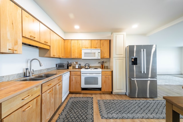 27607 Elba Dr, Grosse Ile, MI 48138 - kitchen featuring white appliances, a sink, light wood finished floors, light countertops, and recessed lighting
